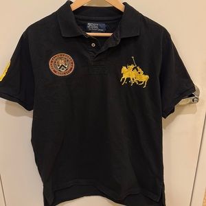 Used Polo by Ralph Lauren Men’s dark blue with logos on front.